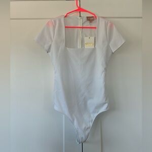 Show me your MuMu white bodysuit. NWT. Square neck and zip up
